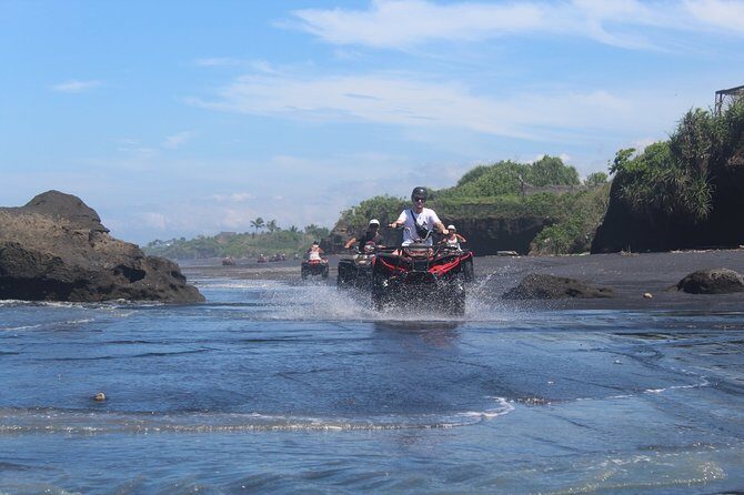 Bali ATV Ride In the beach black sand atv tour - Through rice fields and villages: the quieter part of the day