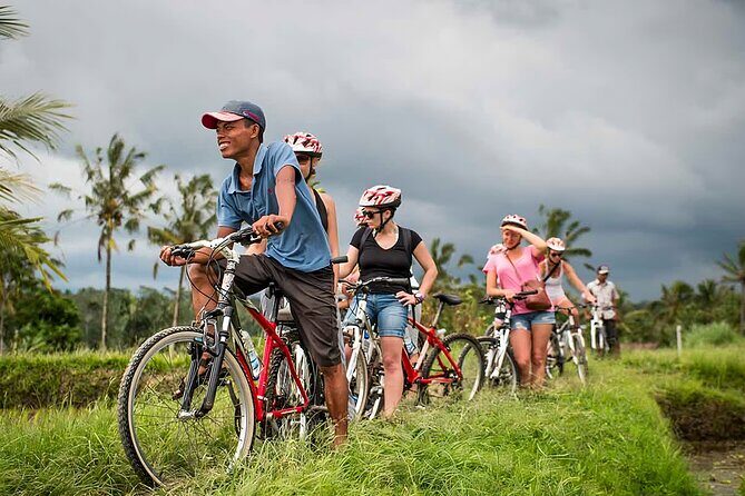 Bali Cycling and Ubud Waterfall Tour - Tegenungan Waterfall: the photo moment with local pull