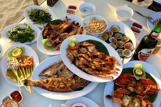 Bali Water Sports and Uluwatu Tour Packages - Jimbaran Beach seafood dinner: set menu, sunset energy
