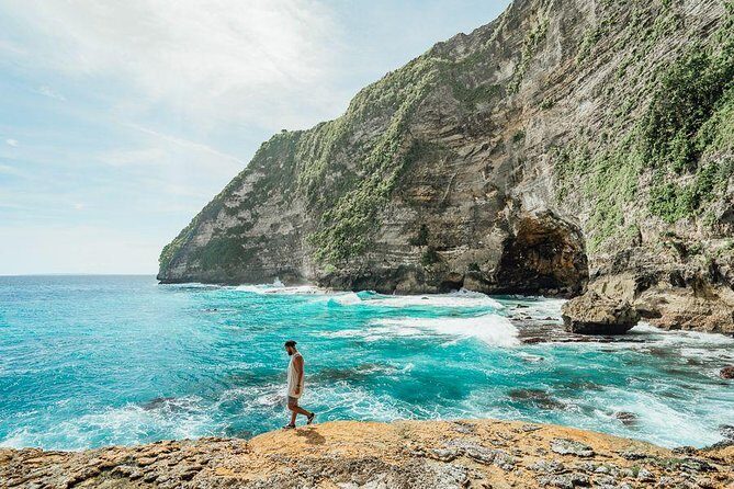 Full-Day Tour To Nusa Penida Bali - Diamond Beach on the east: sharp cliffs, strong views, and a calmer pace