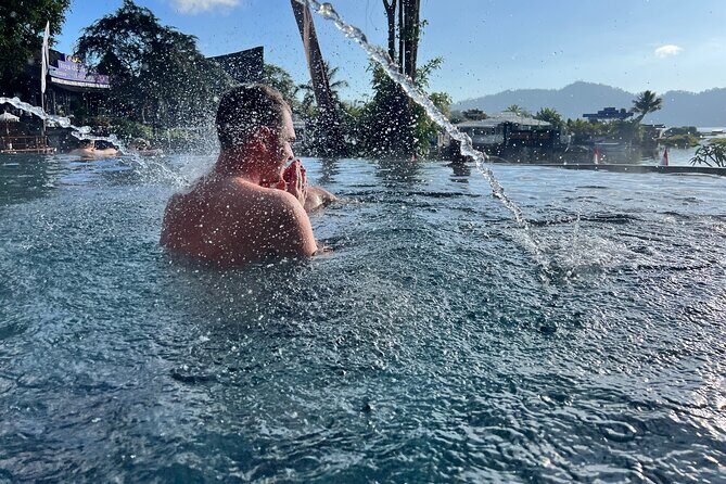 Mount Batur Sunrise Jeep Tour and Hot Spring - Stop 1: Mount Batur sunrise from the lookout, plus black volcanic terrain