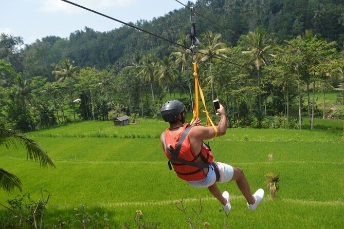 Telaga Waja River Rafting Bali & Zipline (Less Stairs) - The middle stop: waterfall photos and the zipline moment