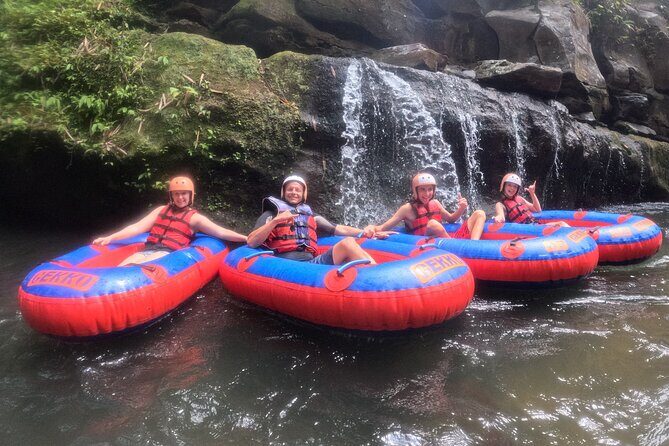 Ubud Tubing Adventure Holy Spring Temple Private Guided Tour - Getting Picked Up in Seminyak Without the Headache