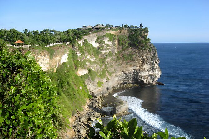 Uluwatu Sunset Trip with Kecak Dance Show and Jimbaran Dinner - Uluwatu Temple: 70-Meter Sea Views and Monkey Reality Checks
